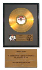 - KISS "Love Gun" Gold Record Award