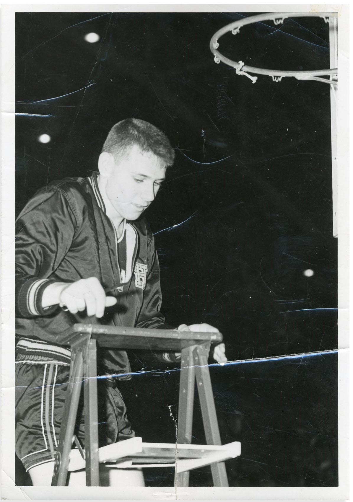 Basketball - 1954 Milan High School Bobby Plump Cuts Down Net Type 1 Photo