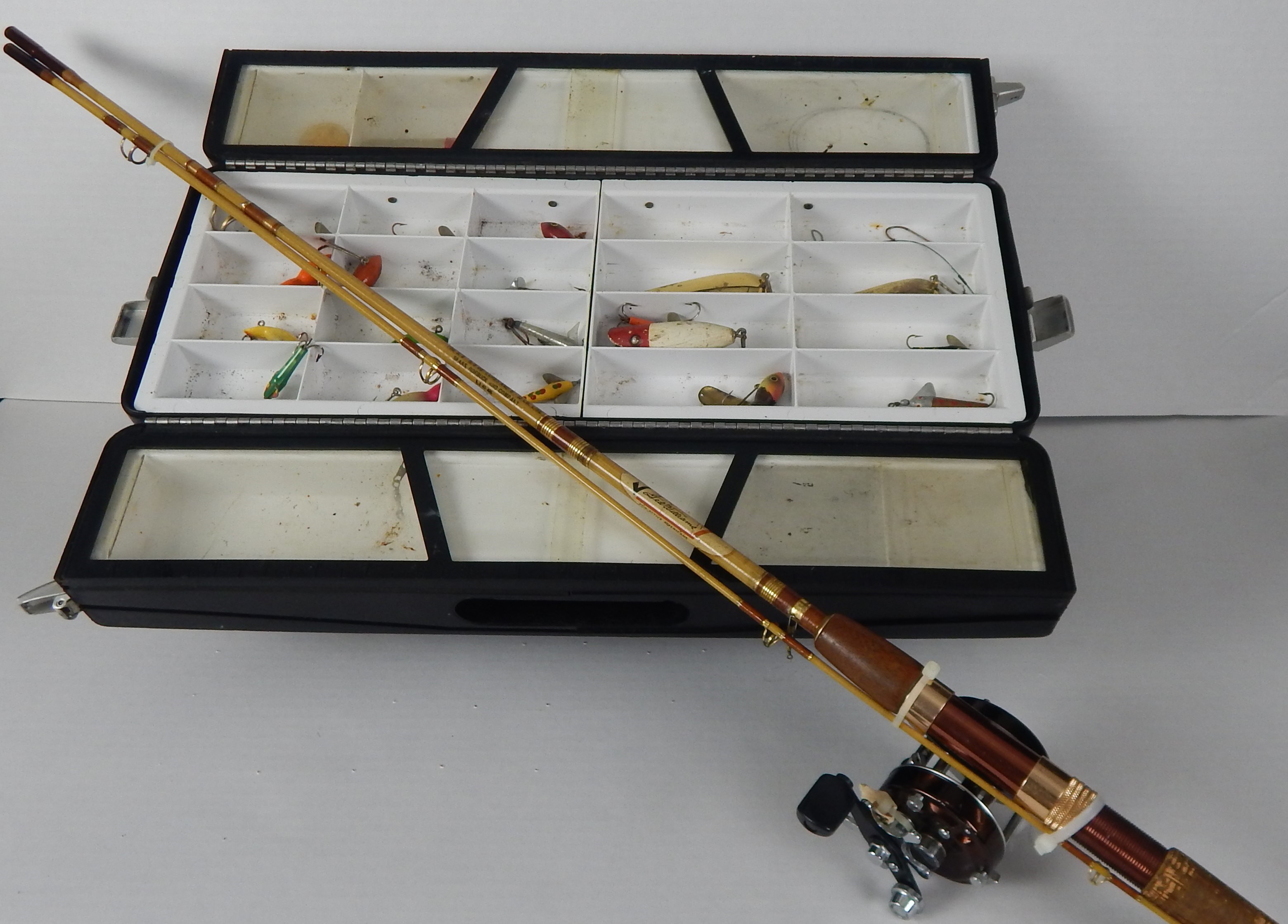 Sold at Auction: 7 fishing rods and 3 reels: Zebco, Ted Williams, JC.  Higgins, Wright & McGill