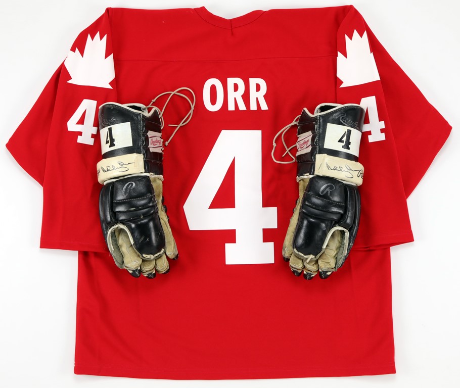 - Bobby Orr Signed Game Issued Gloves and Signed Jersey